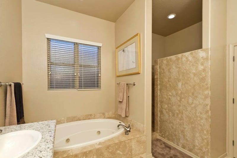 Soak in this oversized tub or step into the walkin shower