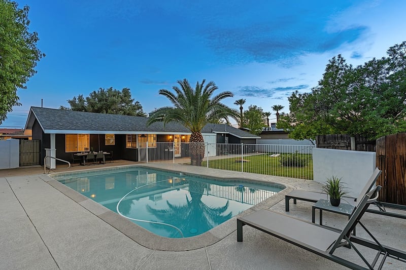 Sparkling pool and sun loungers