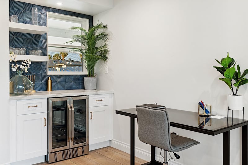 Wine bar w wine fridge and desk workspace
