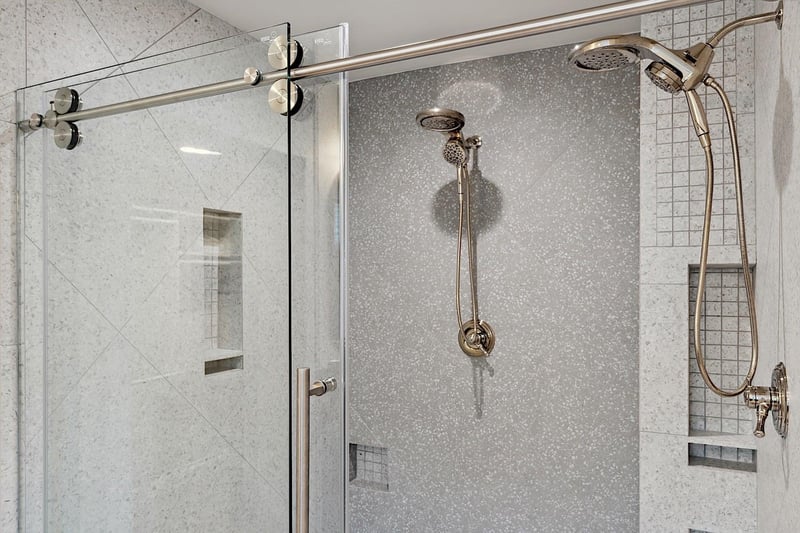 Large walkin shower with dual shower heads larger in person than in the photos