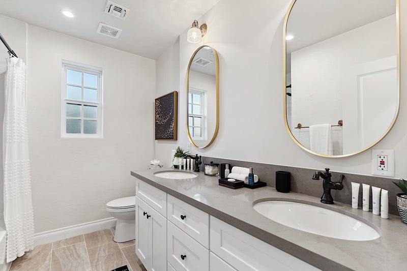Second bathroom  Dual sinks and tub shower combo