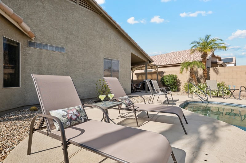 Kick back and relax poolside with a drink