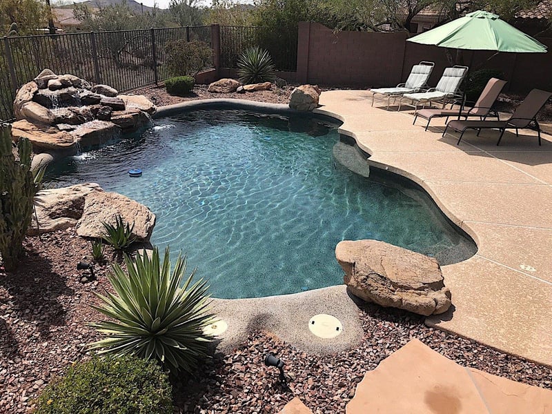 Heated Pool with water feature