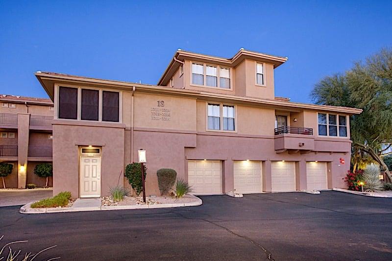 Outside of the condo  2 single car garages