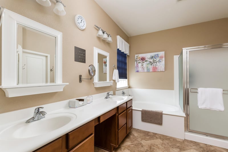 Master Bathroom off of master bedroom. Built in Make up Mirror.