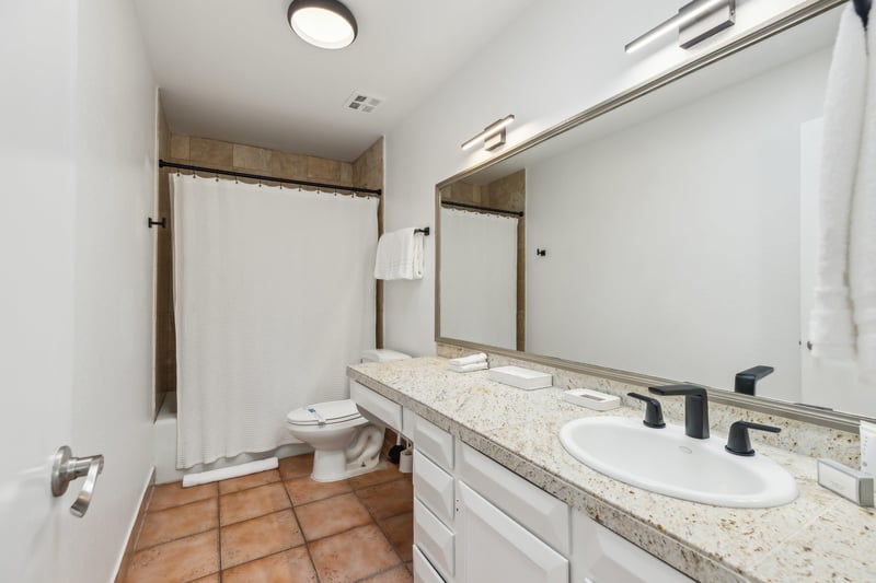 Hallway Bathroom with plenty of vanity space