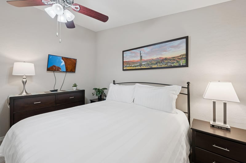 Comfy king bed with fresh linens, perfect for a restful nights sleep