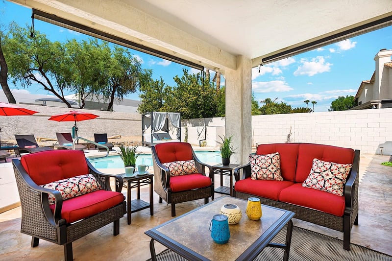 Covered patio  Conversation area w mounted Smart TV