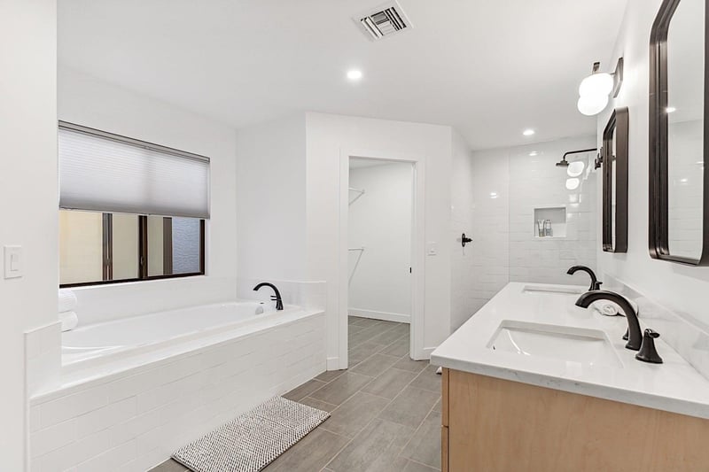 Master bathroom  Large soaking tub, walkin shower, his  hers sinks and dual walkin closets