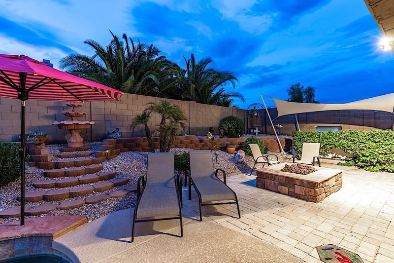 Chaise lounges and a fire pit
