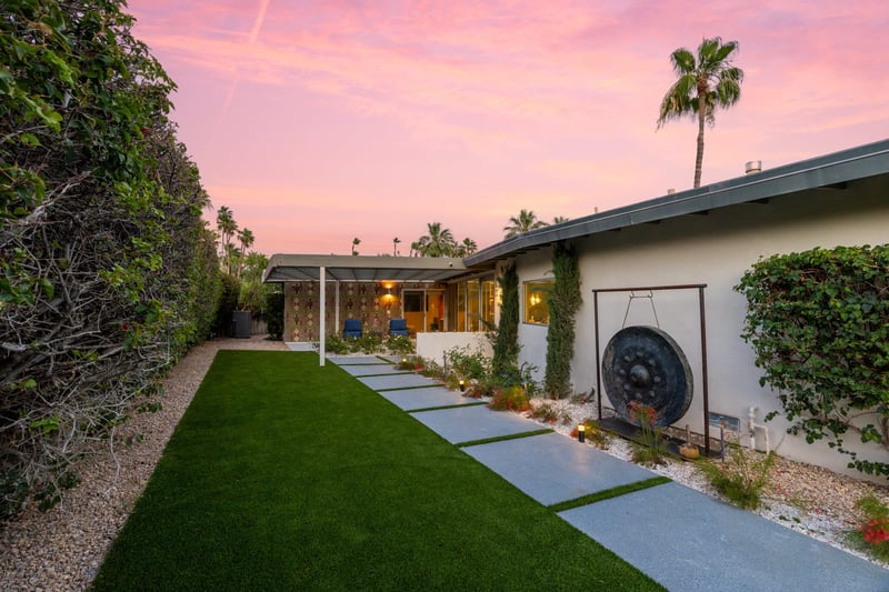 Walkway leading to the front of the home.