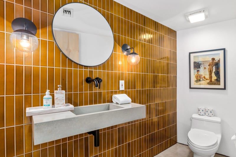 Beautifully tiled guest bathroom.