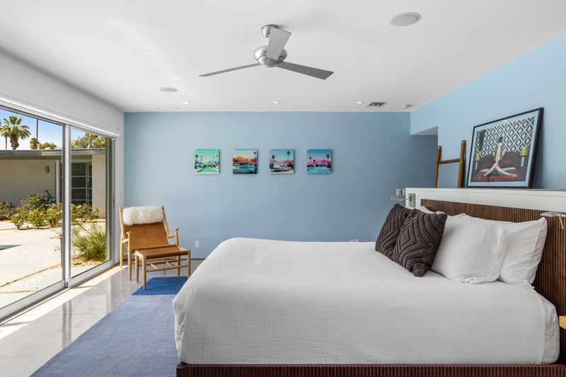 Features a king size bed, large sliding doors to poolspa and patio, ensuite bathroom, and smart TV.