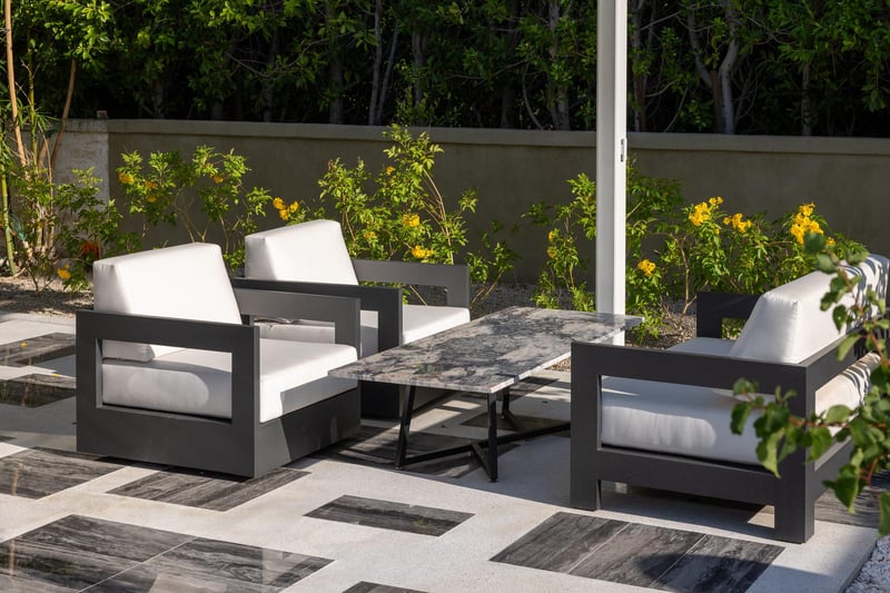 Additional seating area next to outdoor dining space.