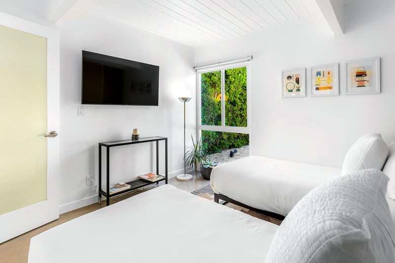 Guest bedroom with access to the yard