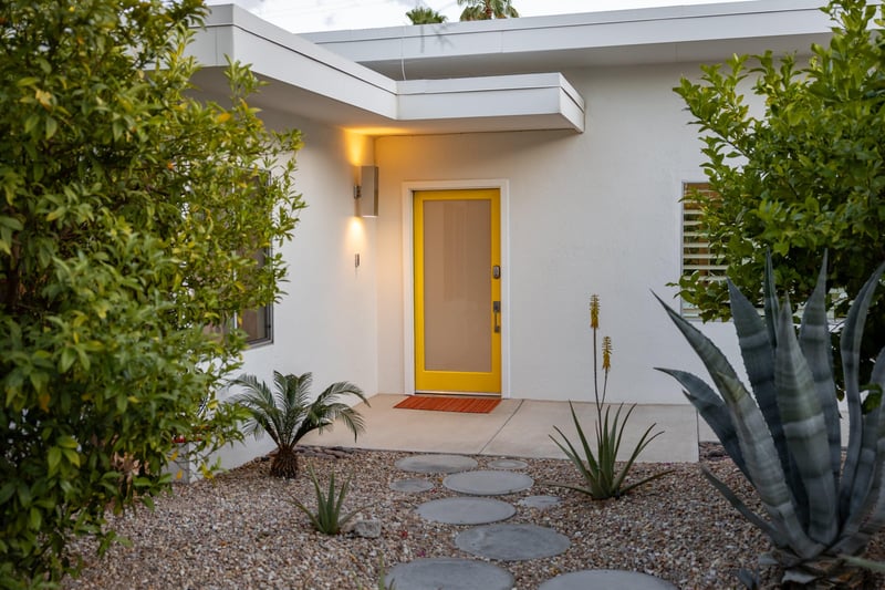 A welcoming yellow door