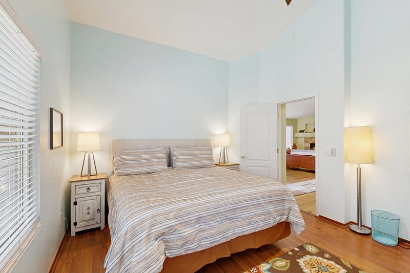 King size bed, reading area, and ensuite bathroom.