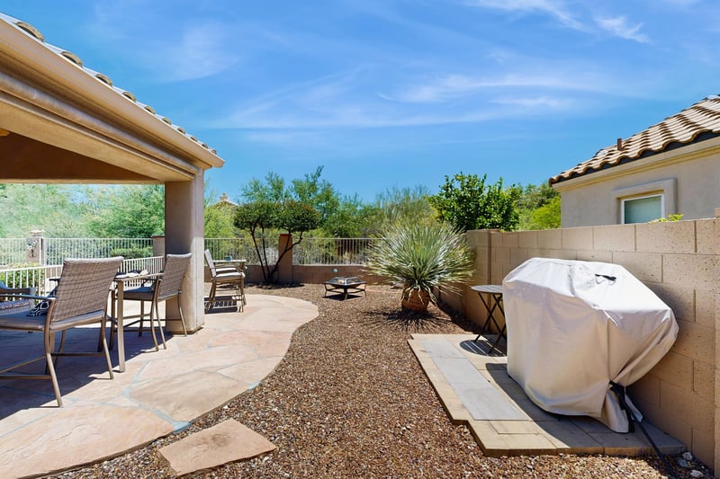 Equipped with outdoor seating, an outdoor fan, covered area for shade, BBQ, firepit, and spool access.