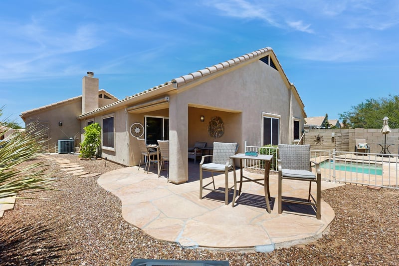 Equipped with outdoor seating, an outdoor fan, covered area for shade, BBQ, firepit, and spool access.