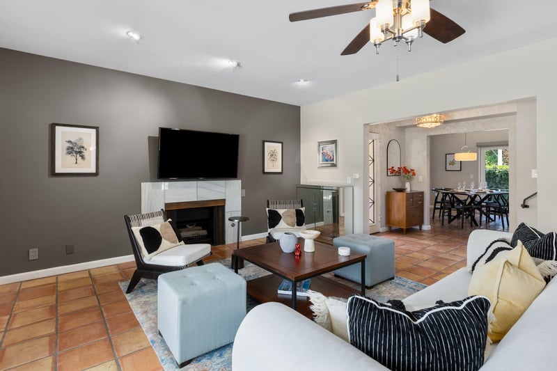 Additional view of fireplace and TV.