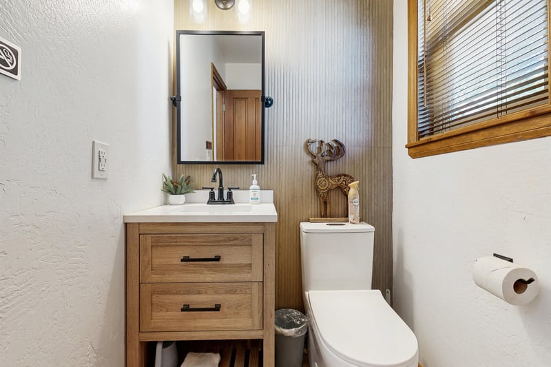 Half bathroom with modern fixtures.