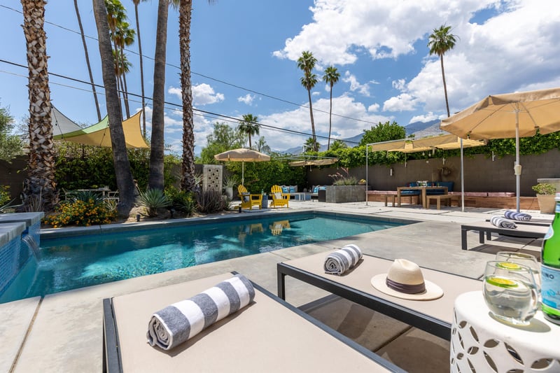 Sunbathe on pool loungers while overlooking the pool