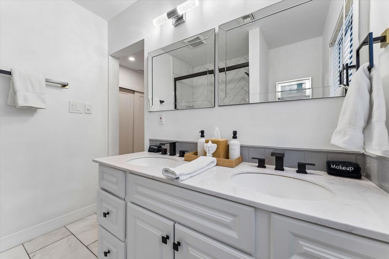 Ensuite bathroom with showertub combination.