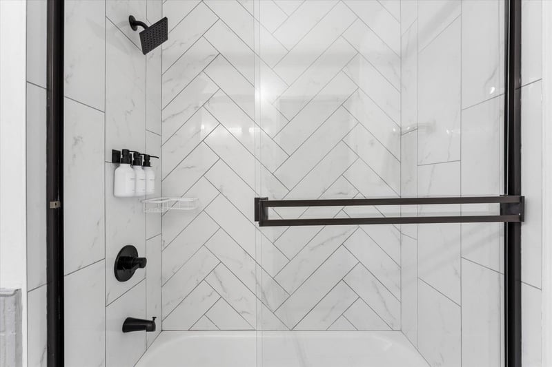Ensuite bathroom with showertub combination.