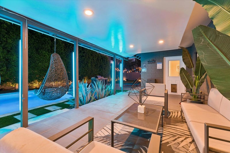 Equipped with outdoor seating, TV, pool table, swinging chairs, misters and speakers.