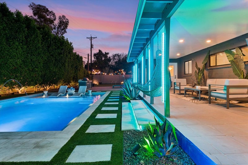 Private pool, hot tub, basketball hoop, lounge chairs, and hot tub with a cabana.