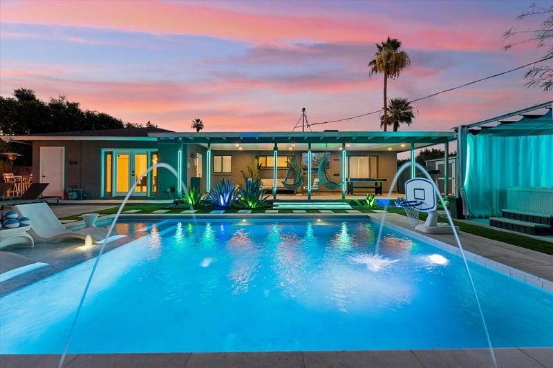 Private pool, hot tub, basketball hoop, lounge chairs, and hot tub with a cabana.