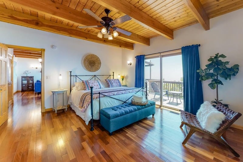 Located on the main entrance level featuring a King bed, walk out to the deck with amazing views