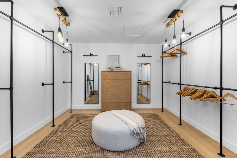 Gigantic walkin primary closet  do you have enough clothes to fit in here