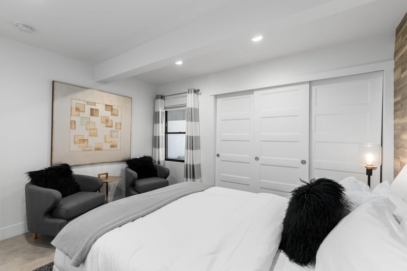 Seating area and view of closet.