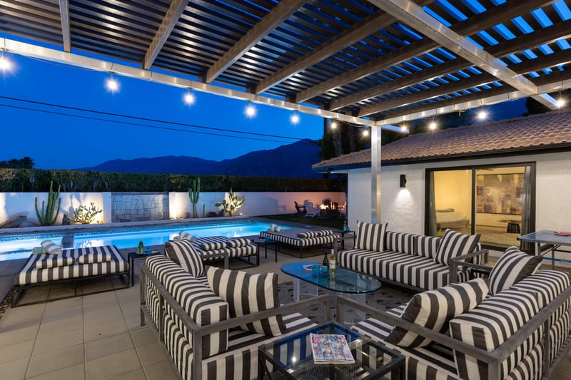 Large patio area with string lights.