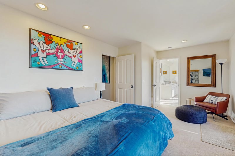 King size bed, smart TV, fireplace, private deck access, and ensuite bathroom.