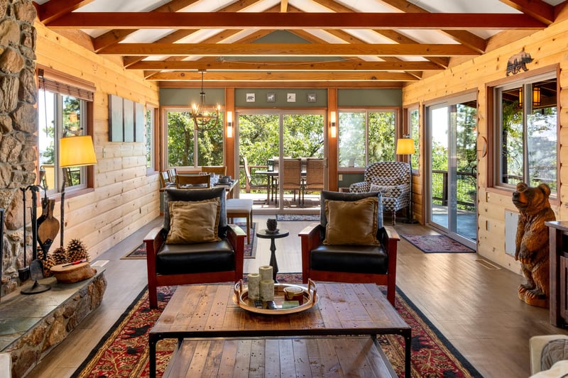 Massive natural rock woodburning fireplace.