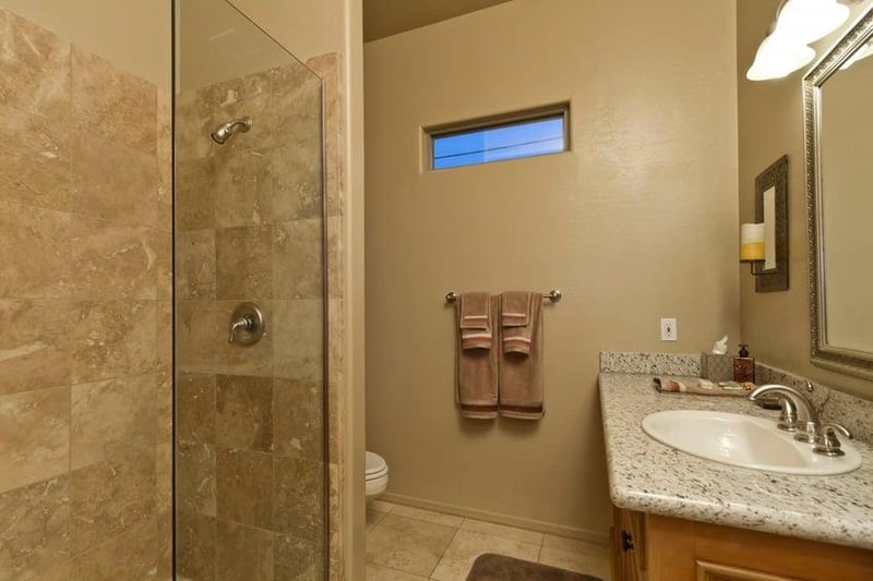 The guest bathroom has a great walkin shower