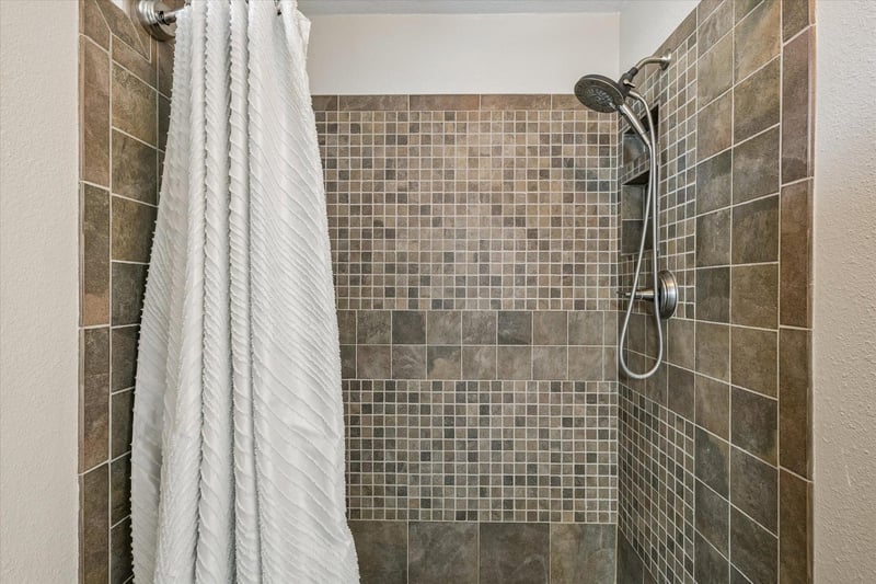 Shower with detachable showerhead.