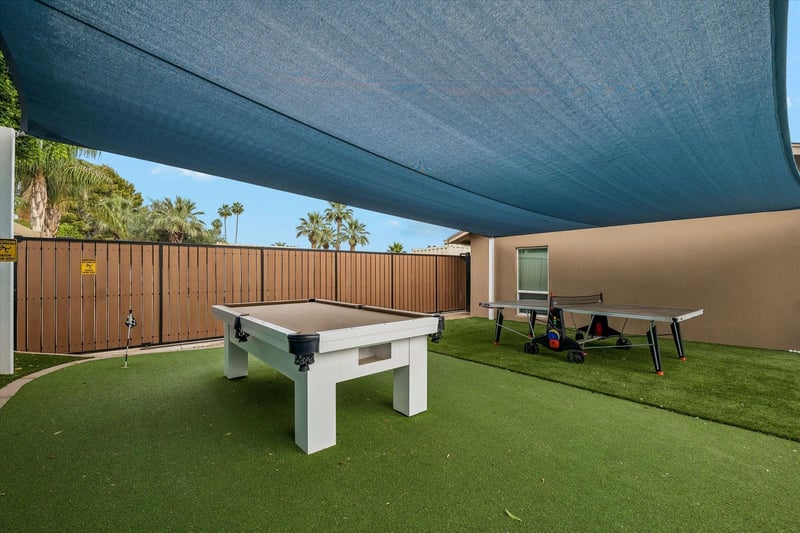 Sunsails, mini golf putting green, and pool table.