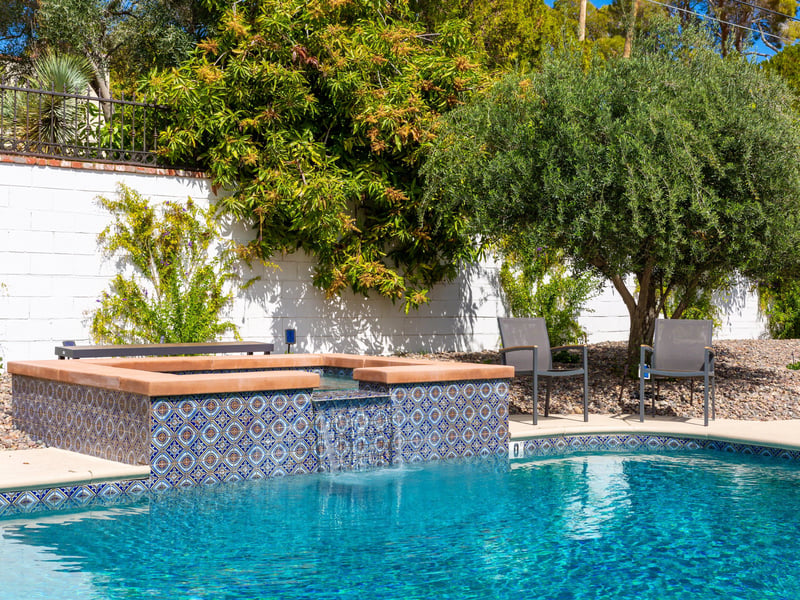 Integrated pool and spa