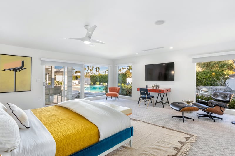 Spacious Primary Suite with direct access to the pool