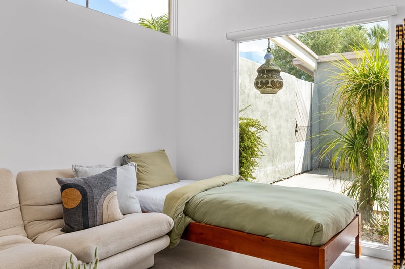 Guest bedroom with Vladimir Kagan sectional