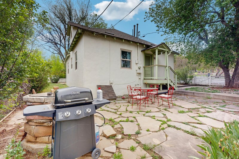 Back patio with outdoor seating and BBQ.