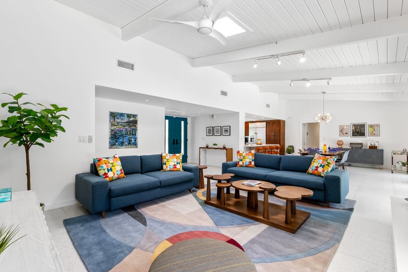 Living room flows into the dining area and kitchen.