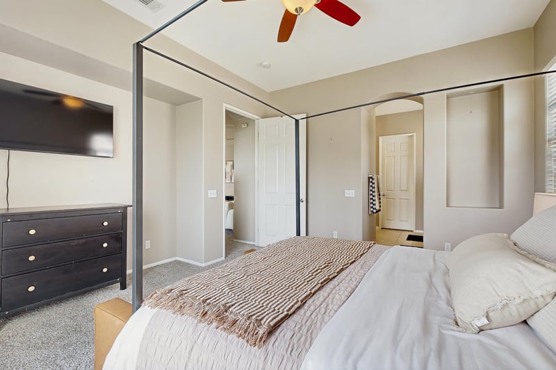 Includes flatscreen TV and view of en suite bathroom.