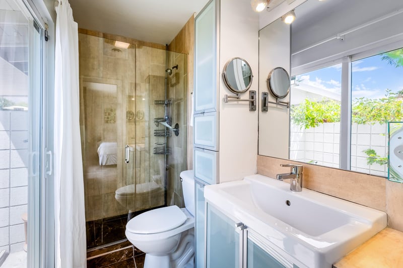 Primary bedroom with access to the Pool Deck