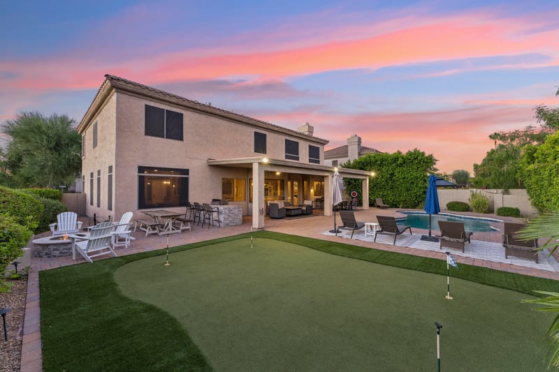 Private putting green next to the firepit.
