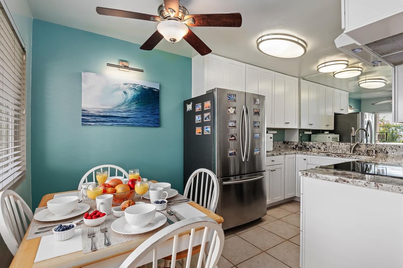 The kitchen and dining area open up to the living room.