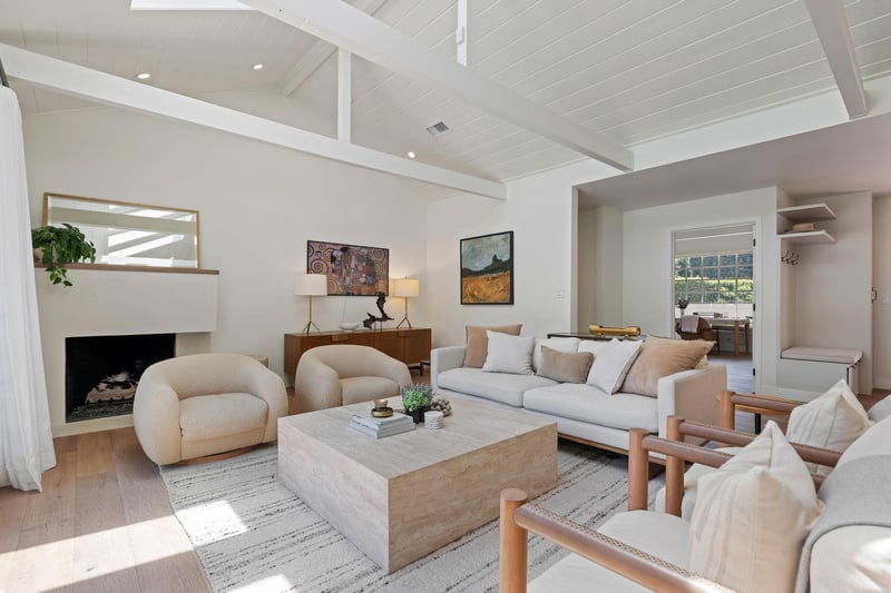 Main Living Room with TV, Fireplace, and Second Bedroom
